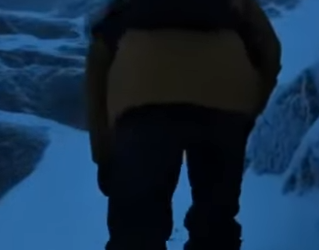 P0101006 In freezing mountains, snow leopard carries her cub to man (Part 2)