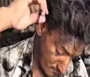 X0206003 Cutting the messy hair of a homeless person (Part 2)